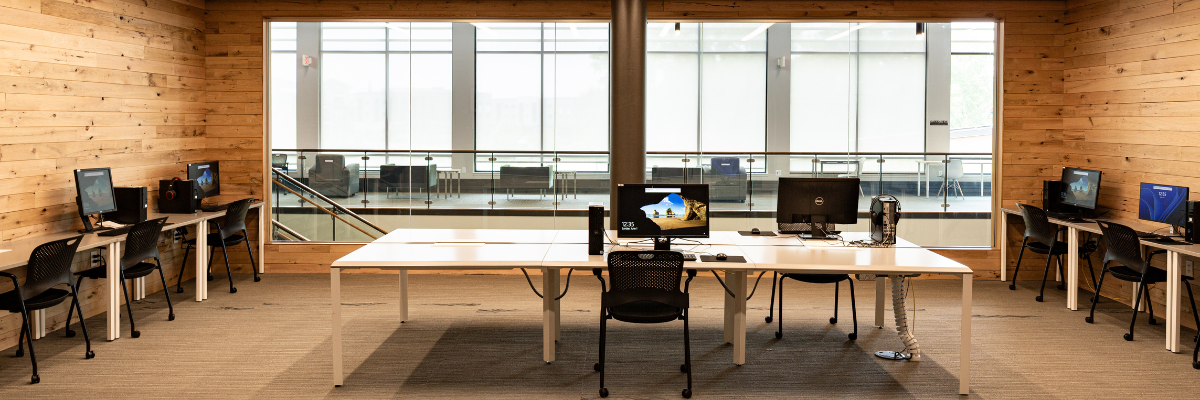 Photo of a room with computers and chairs