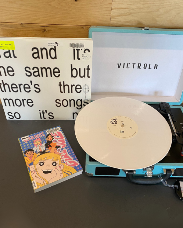 Brat vinyl record and Girl Juice book