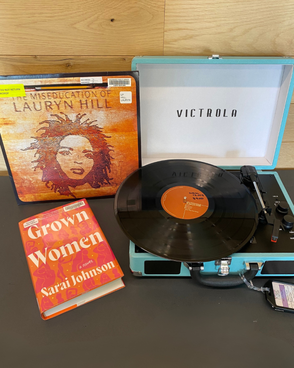 The Miseducation of Lauryn Hill vinyl record and Grown Women book