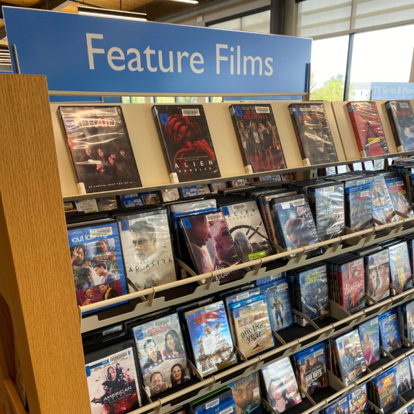 Shelf of DVDs labeled "Feature Films"