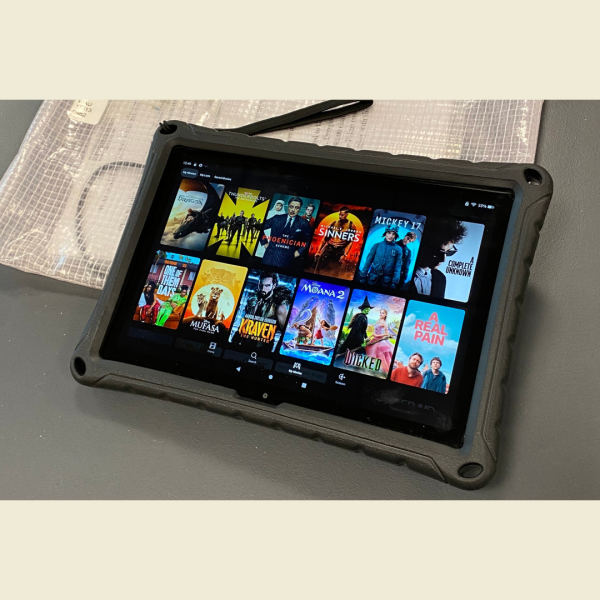Kindle tablet showing movie covers