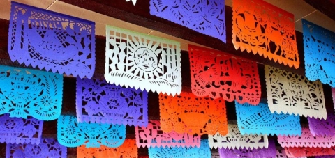 Colorful papel picado banner hung up 