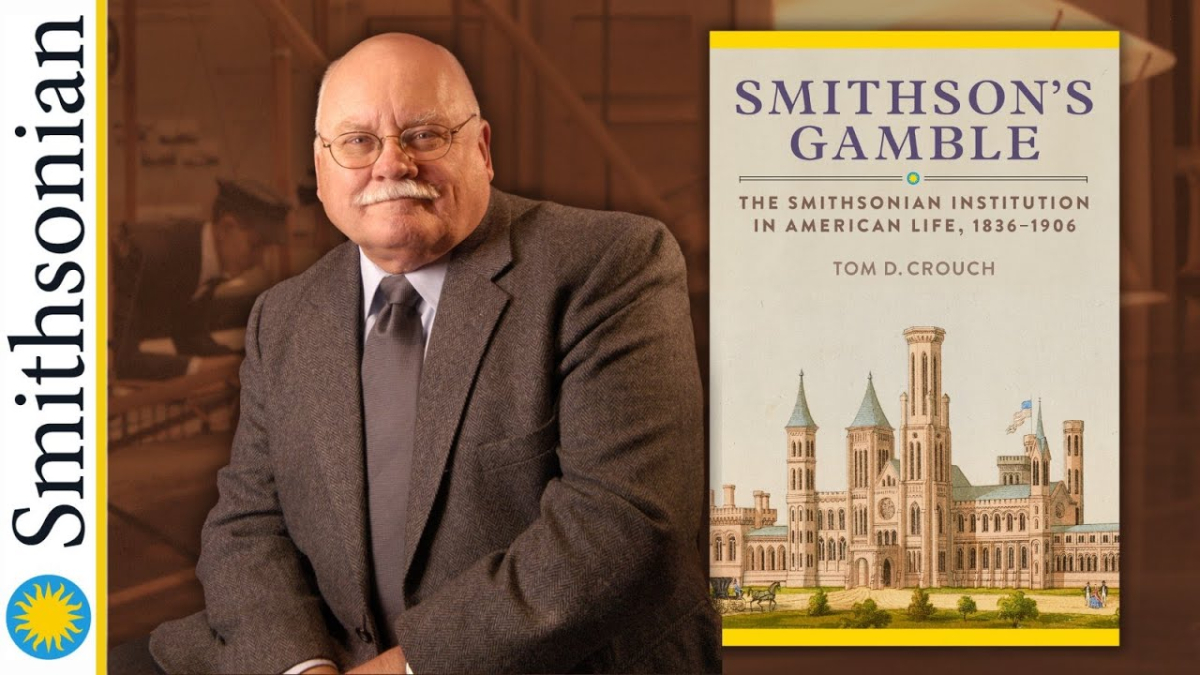 Photo of a man next to the book Smithson's Gamble